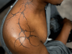 Tattoo black and brown Skin Outliers Ink Tattoo Studio Birmingham