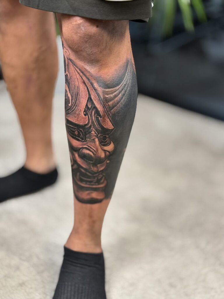 Realism Blackwork Lower Leg Outliers Ink Birmingham tattoo studio