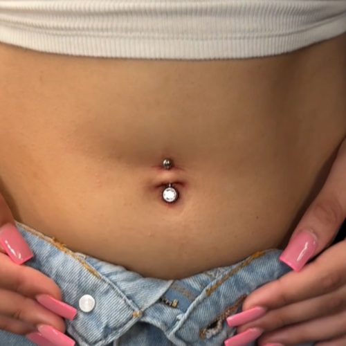 Belly button piercing woman Outliers Ink Piercing Studio birmingham